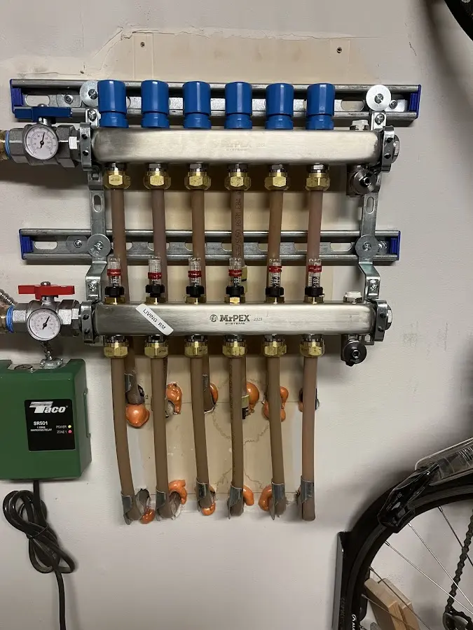 Plumber performing Water Heater Repair at a residential property in Lafayette